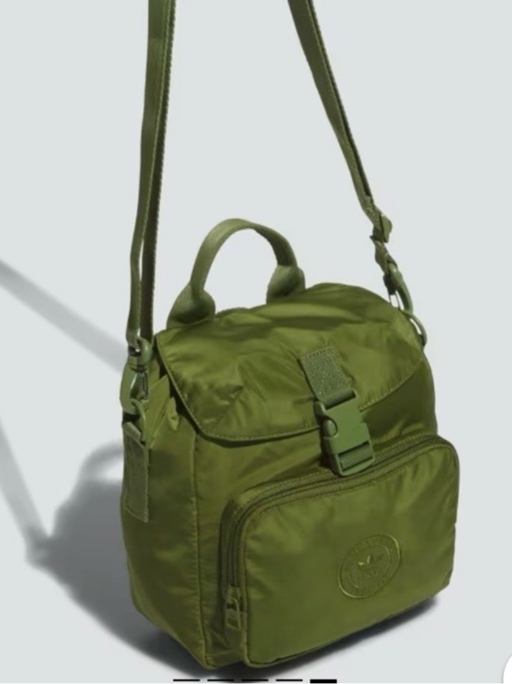 adidas olive green drawstring backpack with front zip pocket